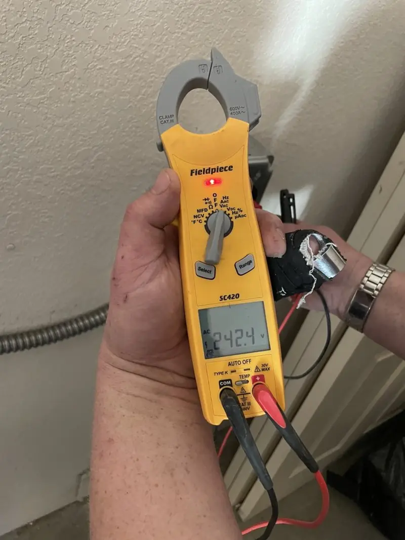 Voltage testing with clamp meter during Hot Tub / Pool Electrical Wiring in Inkster